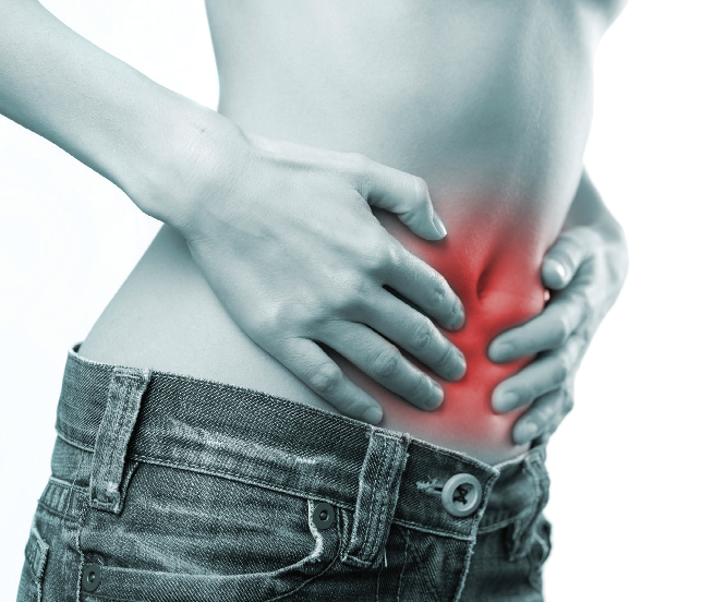 Person grasping their inflamed abdominal area